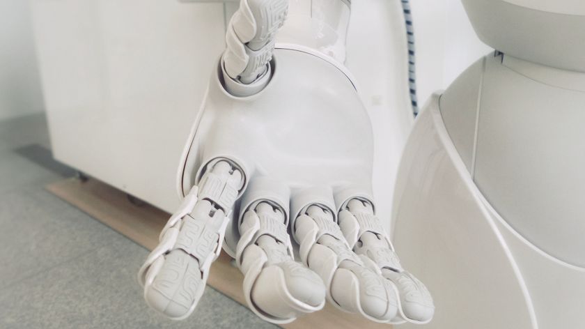 white robot hand extending to you 