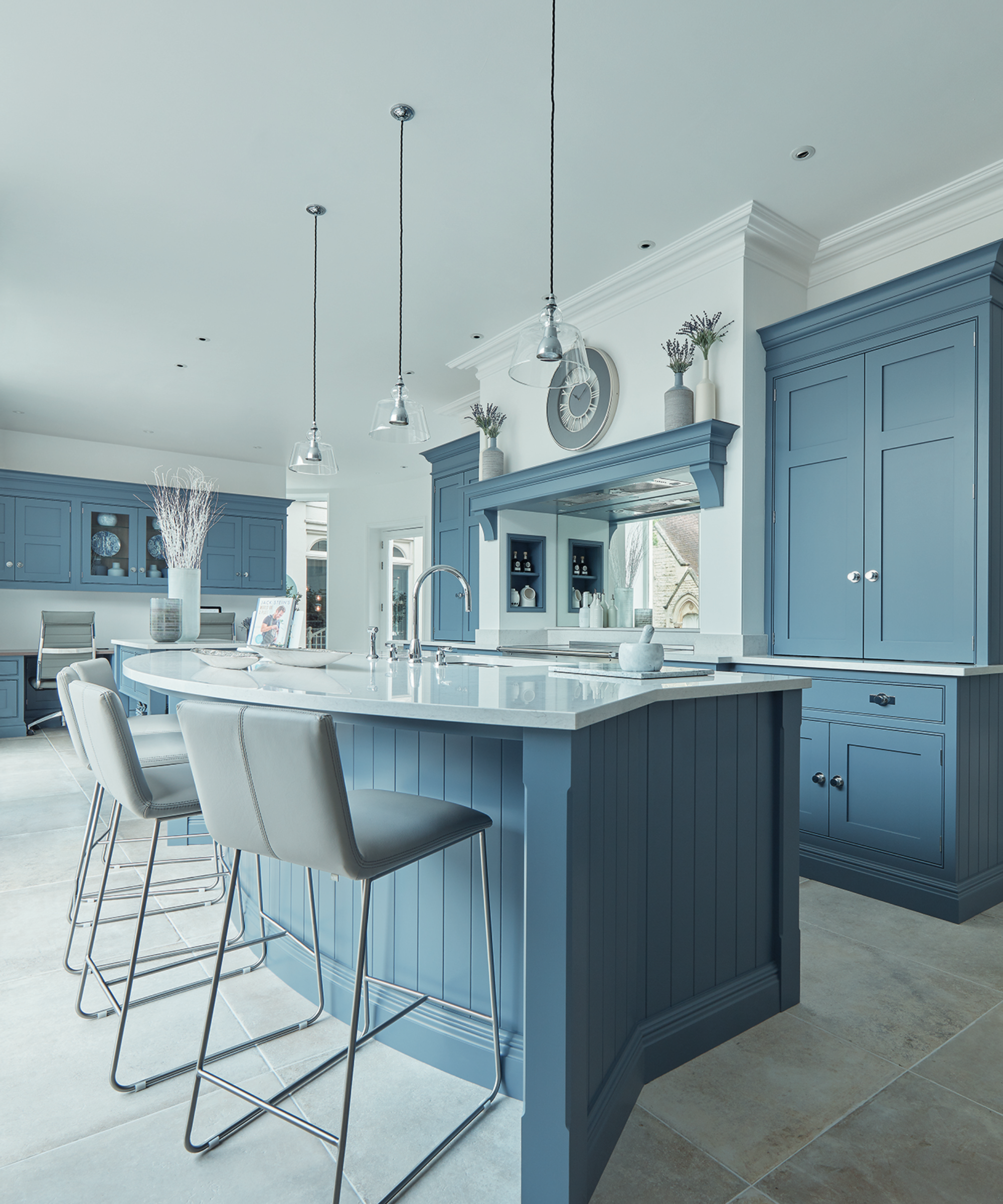 blue breakfast bar in white kitchen