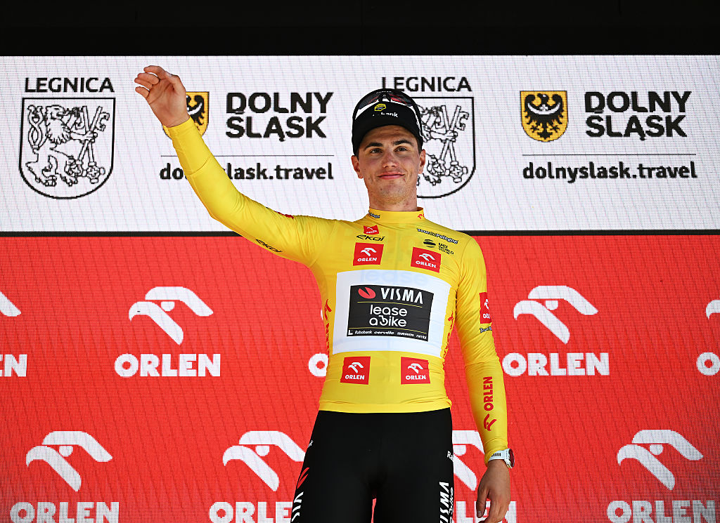 LEGNICA, POLAND - AUGUST 04: Olav Kooij of Netherlands and Team Visma | Lease a Bike celebrates at podium as Yellow leader jersey winner during the 82nd Tour de Pologne 2025, Stage 1 a 199.7km stage from Wroclaw to Legnica on August 04, 2025 in Legnica, Poland. (Photo by Luc Claessen/Getty Images)