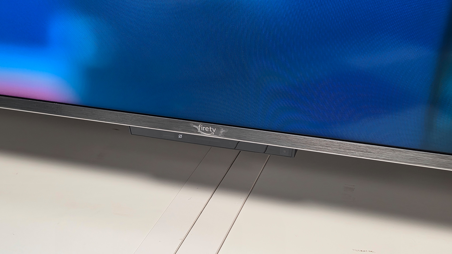 Amazon Fire TV Omni QLED (65-inch) QLED TV, bottom of set showing Amazon Fire logo