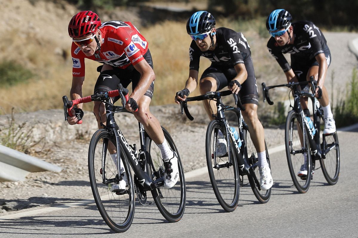 Chris Froome returns the favour to do a turn after his crash