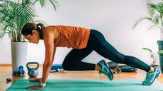 Woman doing a HIIT workout at home