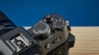 A Fujifilm X-T50 camera in the charcoal grey colorway