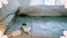 picture of an electric blanket on top of bed with covers off 