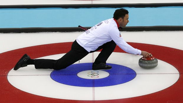 Britain&amp;#039;s David Murdoch takes part in a training session at the Ice cube curling centre during the Sochi Winter Olympics on February 11, 2014.AFP PHOTO / ADRIAN DENNIS(Photo credit should rea