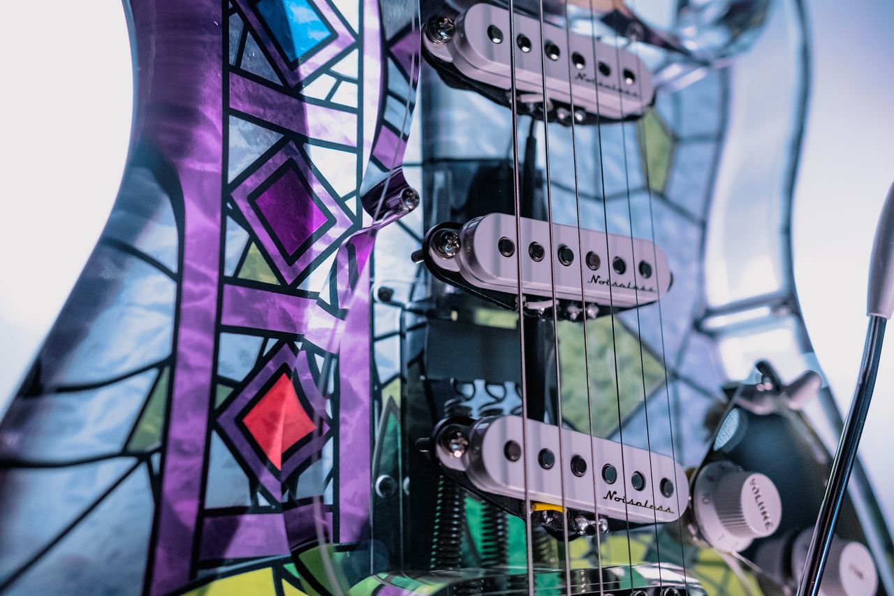 A custom-built stained glass Fender Stratocaster, played by H.E.R. during a live-action performance of Beauty and the Beast