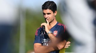 Arsenal manager Mikel Arteta watches his players in training