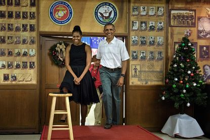 President Obama and First Lady Michelle Obama visit U.S. troops stationed in Hawaii 