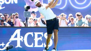 Dustin Johnson takes a tee shot during LIV Golf Andalucia