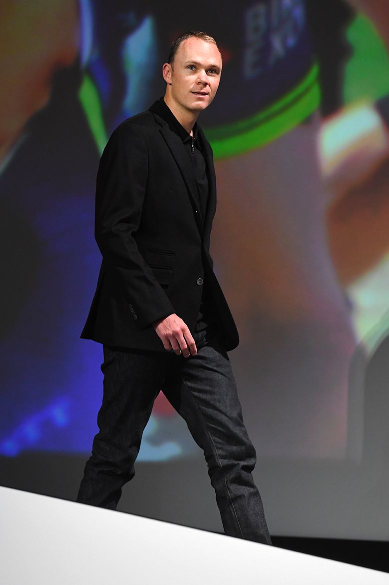 Chris Froome walks on stage at the Tour de France 2017 presentation
