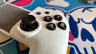 A close-up of the buttons on the Mobile Controller MG-X Pro.