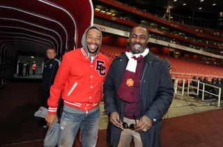 Idris Elba pictured with Thierry Henry ahead of a game between Arsenal and Chelsea at the Emirates Stadium in 2010.