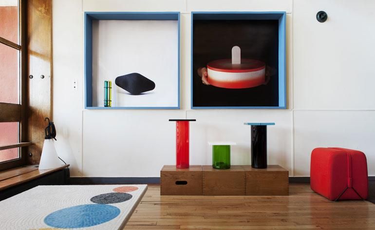 In the living room of Apartment 50, visitors will find Charpin&#039;s &#039;Credscendo&#039; table (left) for Galerie Kreo, &#039;Lisses&#039; vases for Cirva, &#039;Mobidec&#039; footstool for Ligne Roset and a selection of his prints. 