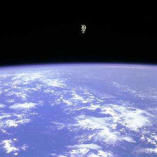 In February 1984, Mission Specialist Bruce McCandless went further away from the confines and safety of his ship than any previous astronaut had ever been. This space first was made possible by the Manned Maneuvering Unit or MMU, a nitrogen jet propelled