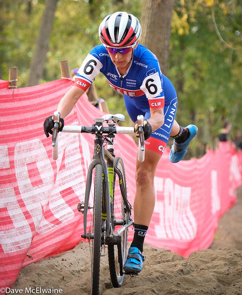 Katerina Nash (Cliff Bar Pro Team) dismounting in the sand with less than two laps remaining
