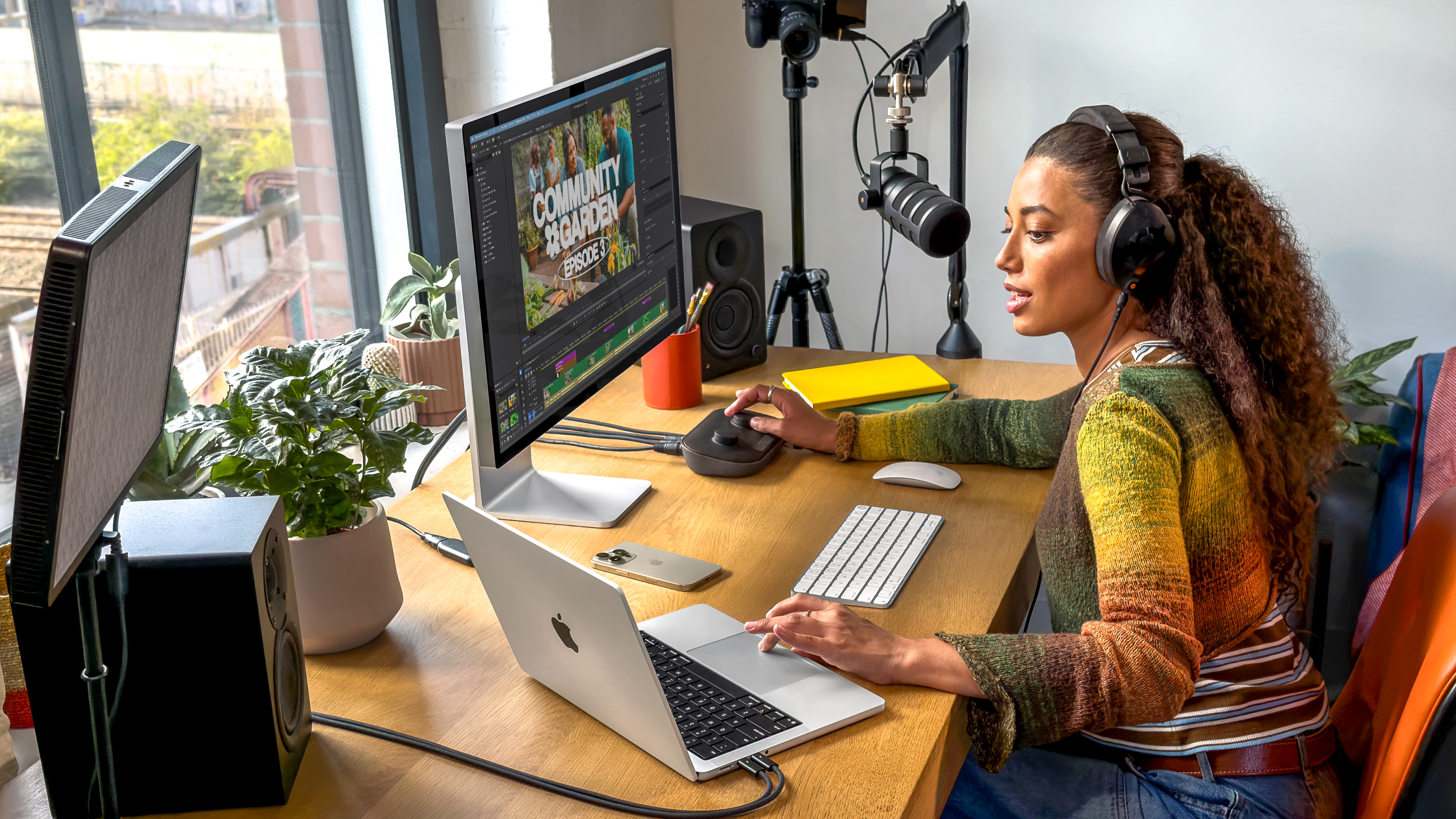 Apple MacBook in use by a video editor and podcaster