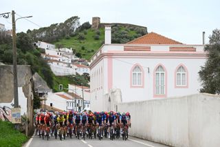 LAGOS PORTUGAL FEBRUARY 14 LR Julien Vermote of Belgium and Team Visma Lease a Bike Louis Vervaeke of Belgium Pieter Serry of Belgium and Team Soudal Quick Step Matteo Trentin of Italy and Tudor Pro Cycling Team Clement Russo of France and Team Groupama FDJ and Warre Vangheluwe of Belgium and Team Soudal Quick Step lead the peloton during the 50th Volta ao Algarve em Bicicleta 2024 Stage 1 a 2008km stage from Portimao to Lagos on February 14 2024 in Lagos Portugal Photo by Dario BelingheriGetty Images