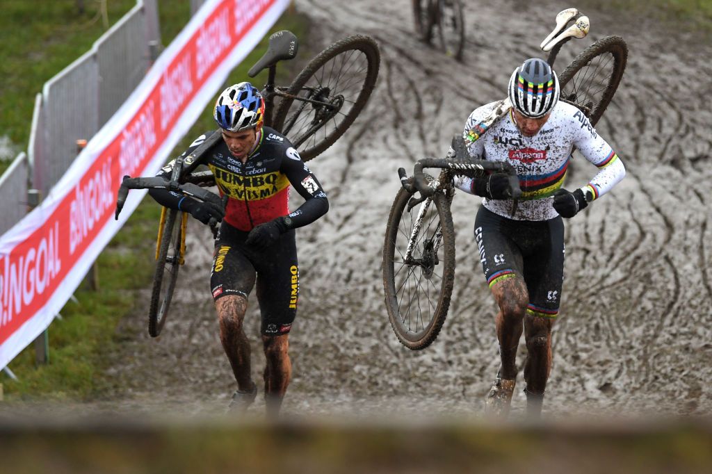 DENDERMONDE BELGIUM DECEMBER 26 LR Wout Van Aert of Belgium and Team JumboVisma and Mathieu Van Der Poel of The Netherlands and Team Alpecin Fenix competeduring the 2nd Dendermonde UCI CycloCross Worldcup 2021 Mens Elite CXWorldCup UCIcyclocrossWC on December 26 2021 in Dendermonde Belgium Photo by Luc ClaessenGetty Images