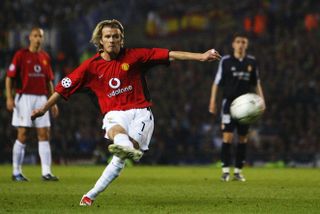 David Beckham scores from a free-kick for Manchester United against Real Madrid in the Champions League in 2003.