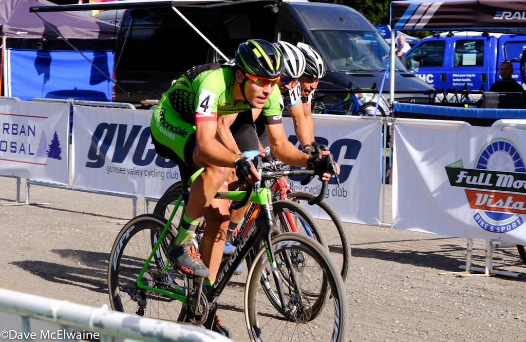 Curtis While (Cannondale) riding in a group of three with one lap to go.