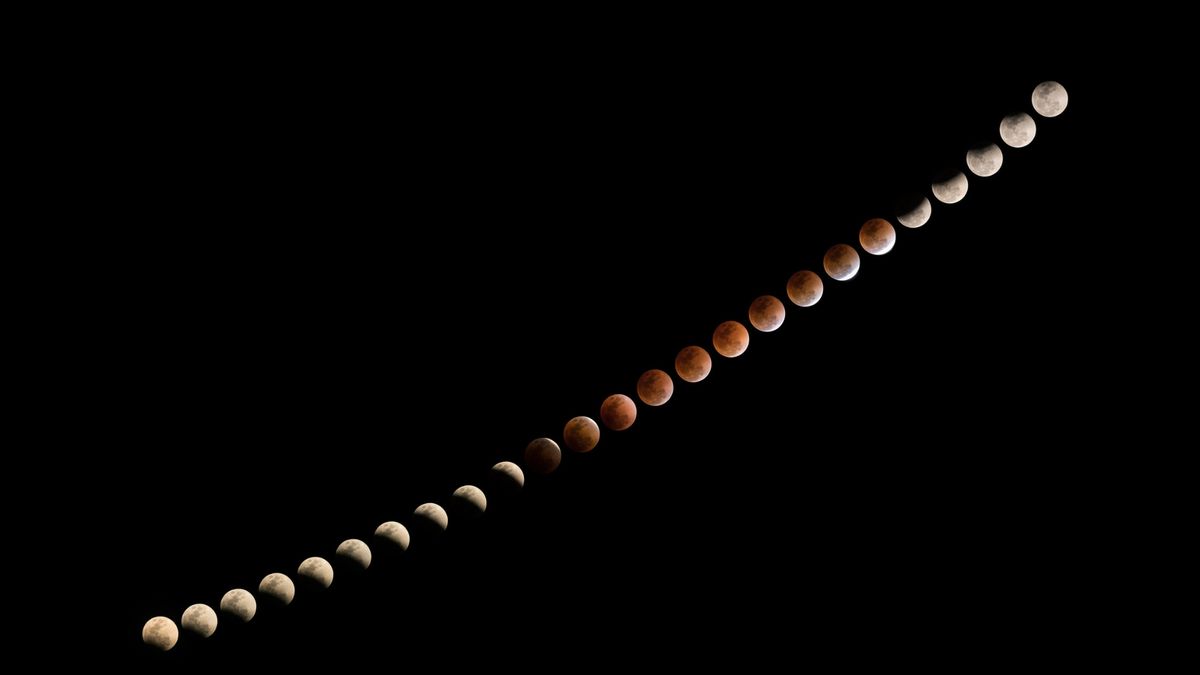 sequence of total lunar eclipse showing the moon get progressively more red and the turning back to it&#039;s usual gray/white.