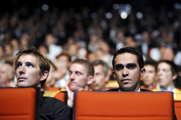 Andy Schleck and Alberto Contador watch the 2013 Tour de France route presentation