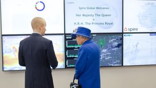 During her visit at Spire, the Queen has learned about the benefits of satellite data in the battle against climate change.