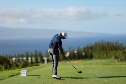 Max Homa launches a drive at The Sentry in Hawaii