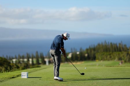 Max Homa launches a drive at The Sentry in Hawaii