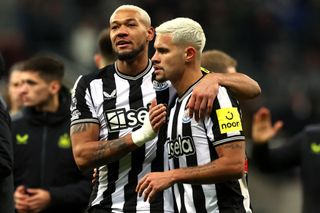 Joelinton of Newcastle United celebrates with teammate Bruno Guimaraes following the team's victory during the Premier League match between Newcastle United and Chelsea FC at St. James Park on November 25, 2023 in Newcastle upon Tyne, England.