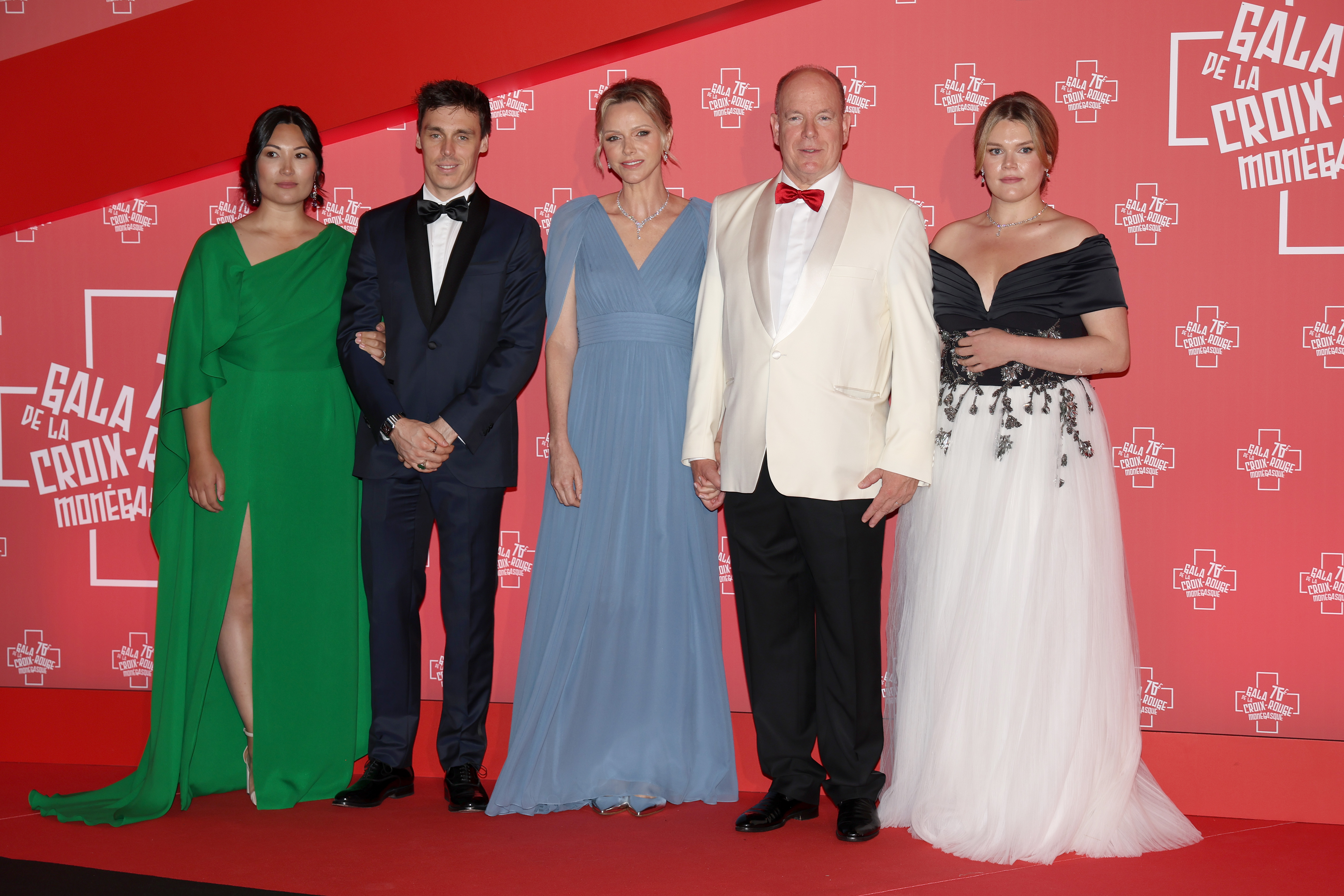 Camille Gottlieb wearing a black and white gown at the Red Cross Monaco Gala 2025 next to Prince Albert, Princess Charlene, Louis Ducruet, and his wife, Marie Ducruet