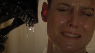 Sigourney Weaver cornered by a drooling Xenomorph in Alien 3.
