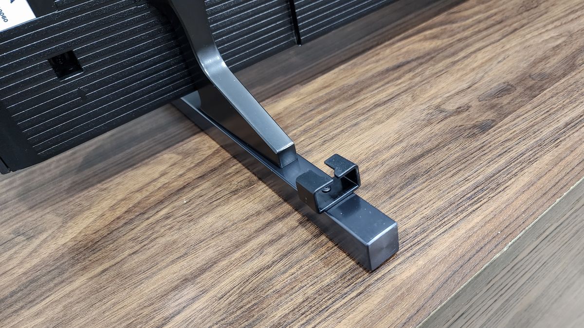 A close-up of the feet on a Hisense U9N Mini-LED TV