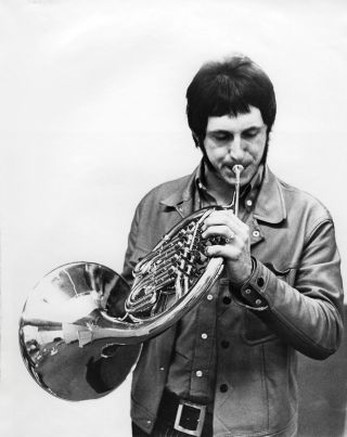 Entwistle at CBS Studios in London playing French horn on Don’t Look Away