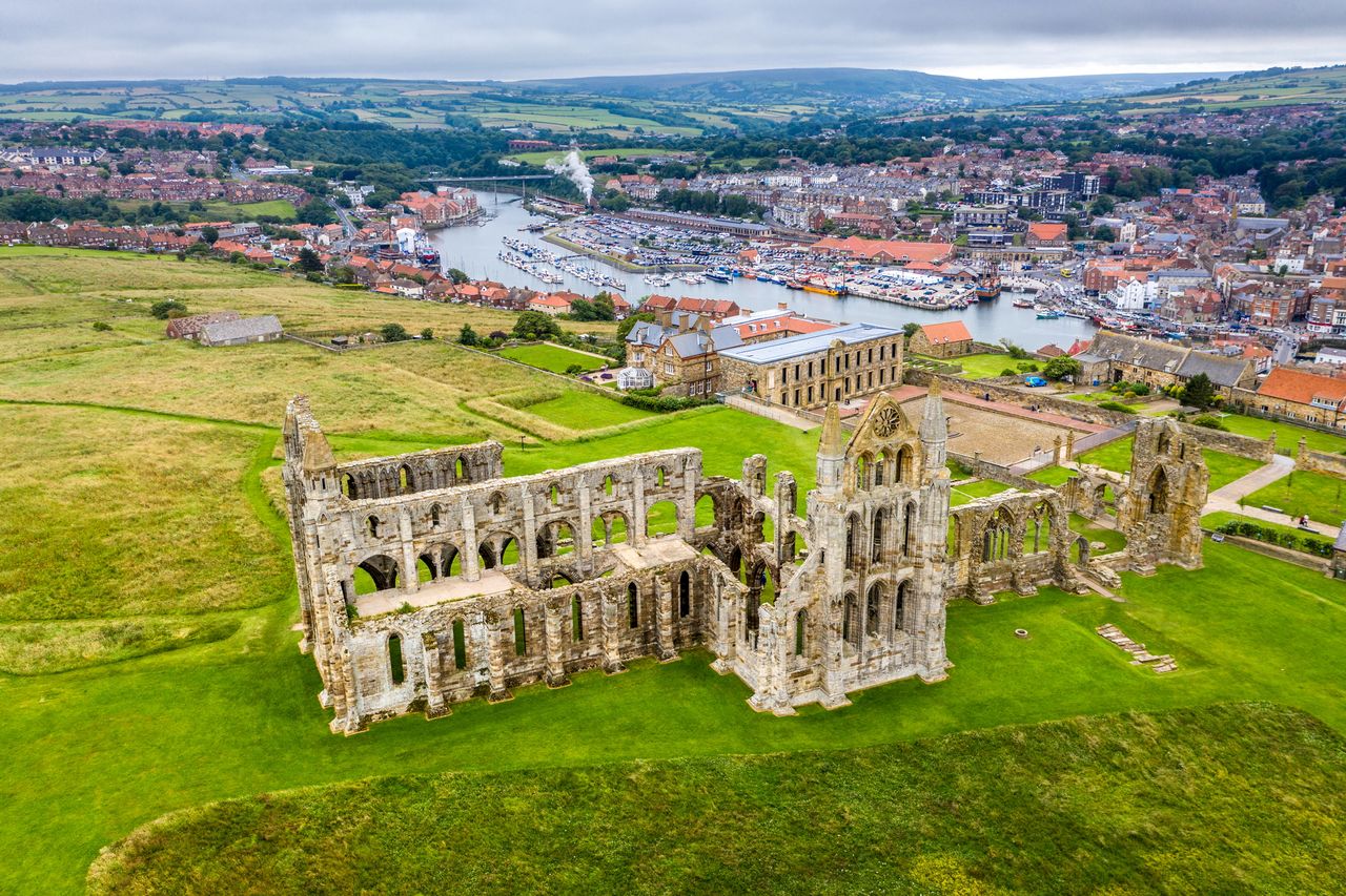 The town of Whitby, with the iconic ruins of the abbey in the foreground.