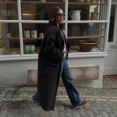 Coat jeans and trainers outfit formula