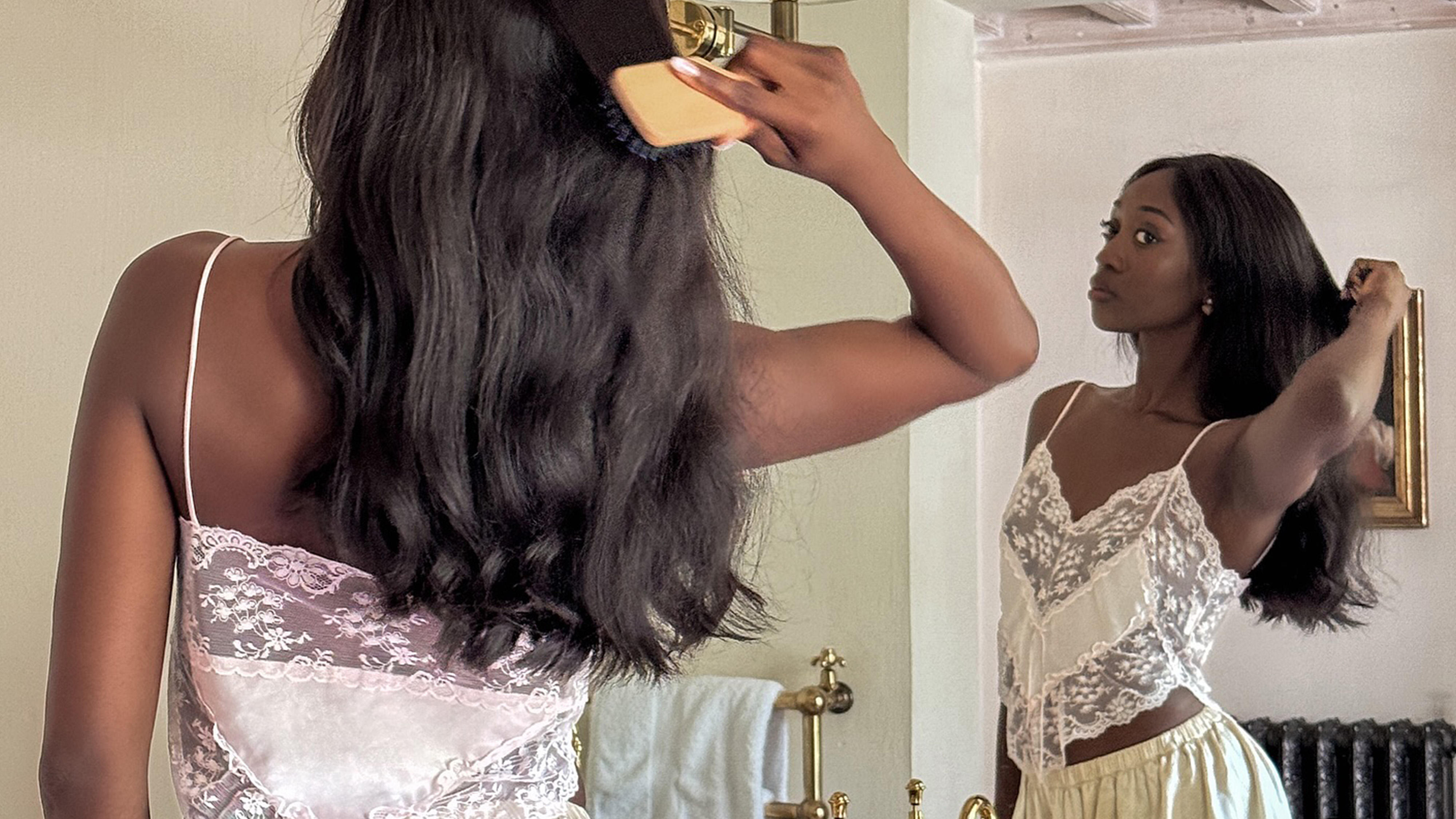 emmanuelle in pajamas with a hair brush