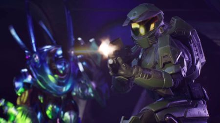 Halo: Campaign Evolved Master chief shooting towards the camera as a hunter runs up from behind