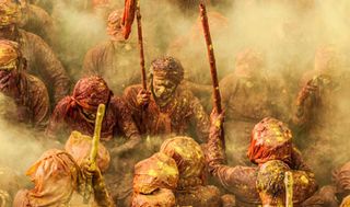 (c) Ioulia Chvetsova, France, Entry, Arts and Culture .Category Open Competition, 2015 Sony World Photography Awards. IIMAGE TITLE: Holi. IMAGE DESCRIPTION: Hindu devotees throw vivid colour