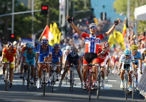 Thor Hushovd (Norway) knew it was close, so didn't celebrate until after the line.