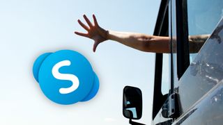 A hand 'throwing' the Skype logo out of a car window.