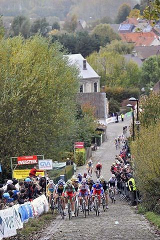 Racers fly up the Koppenberg climb.