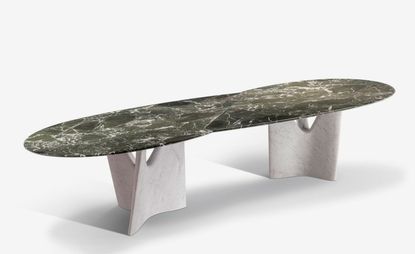 Limited-edition ‘Infinito’ table, available in two sizes, prices on request, by Roberto Lazzeroni, for Poltrona Frau. Black and white marble rounded bench.