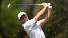 Rory McIlroy plays an iron shot