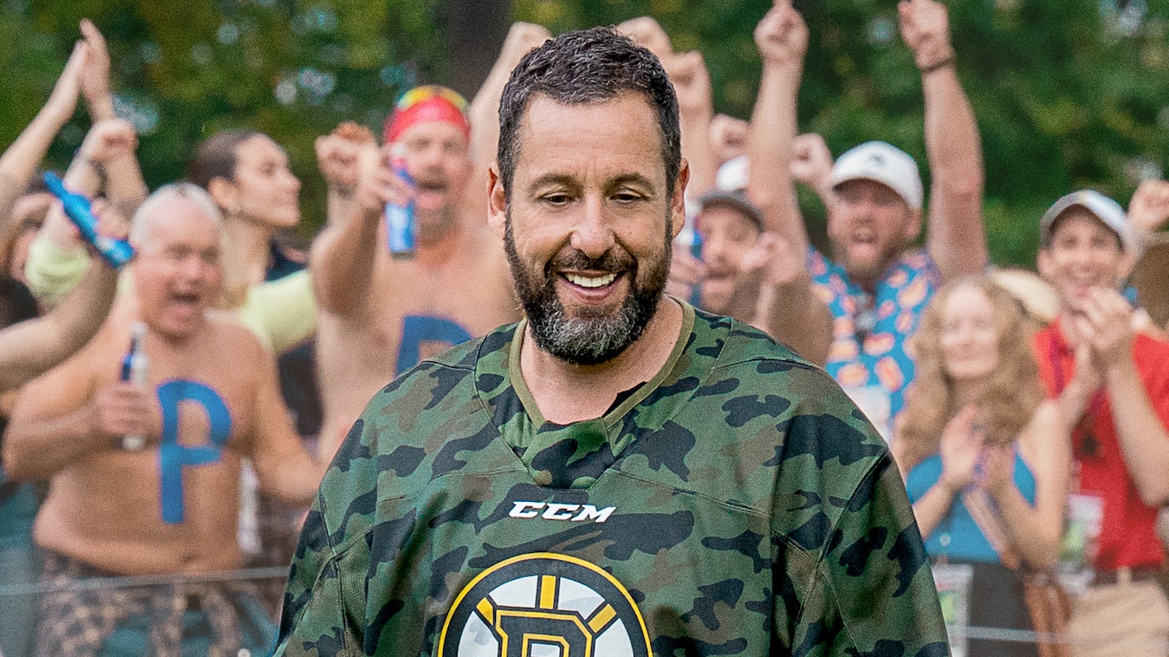 Happy smiling in front of a cheering crowd in Happy Gilmore 2