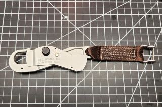The Apollo Tether Hook Keychain produced by Luna Replica and Global Effects replicates the carabiner used by Neil Armstrong on the surface of the moon.