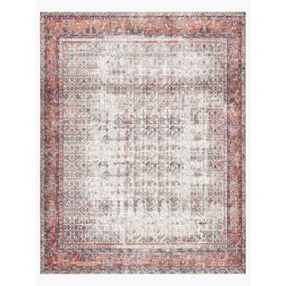 Distressed pink area rug