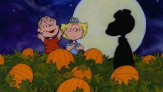 Linus and Sally in the pumpkin patch as Snoopy appears