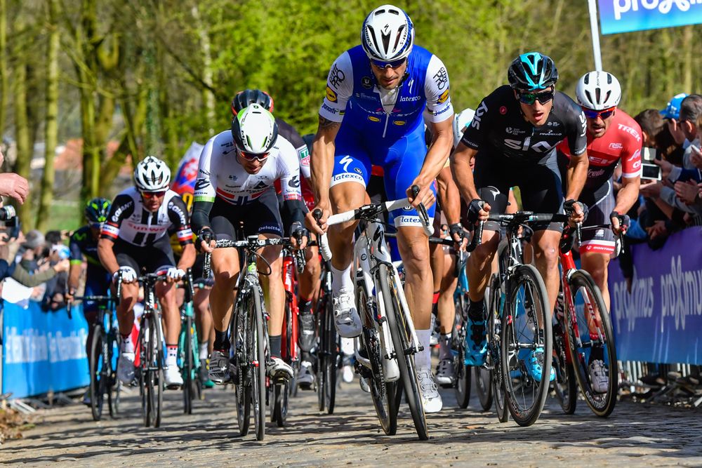 Tom Boonen (QuickStep Floors) leads the bunch up the Kemmelberg for the first time