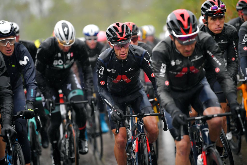 Richie Porte and Geraint Thomas (Ineos Grenadiers) in a rainy Tour de Romandie stage